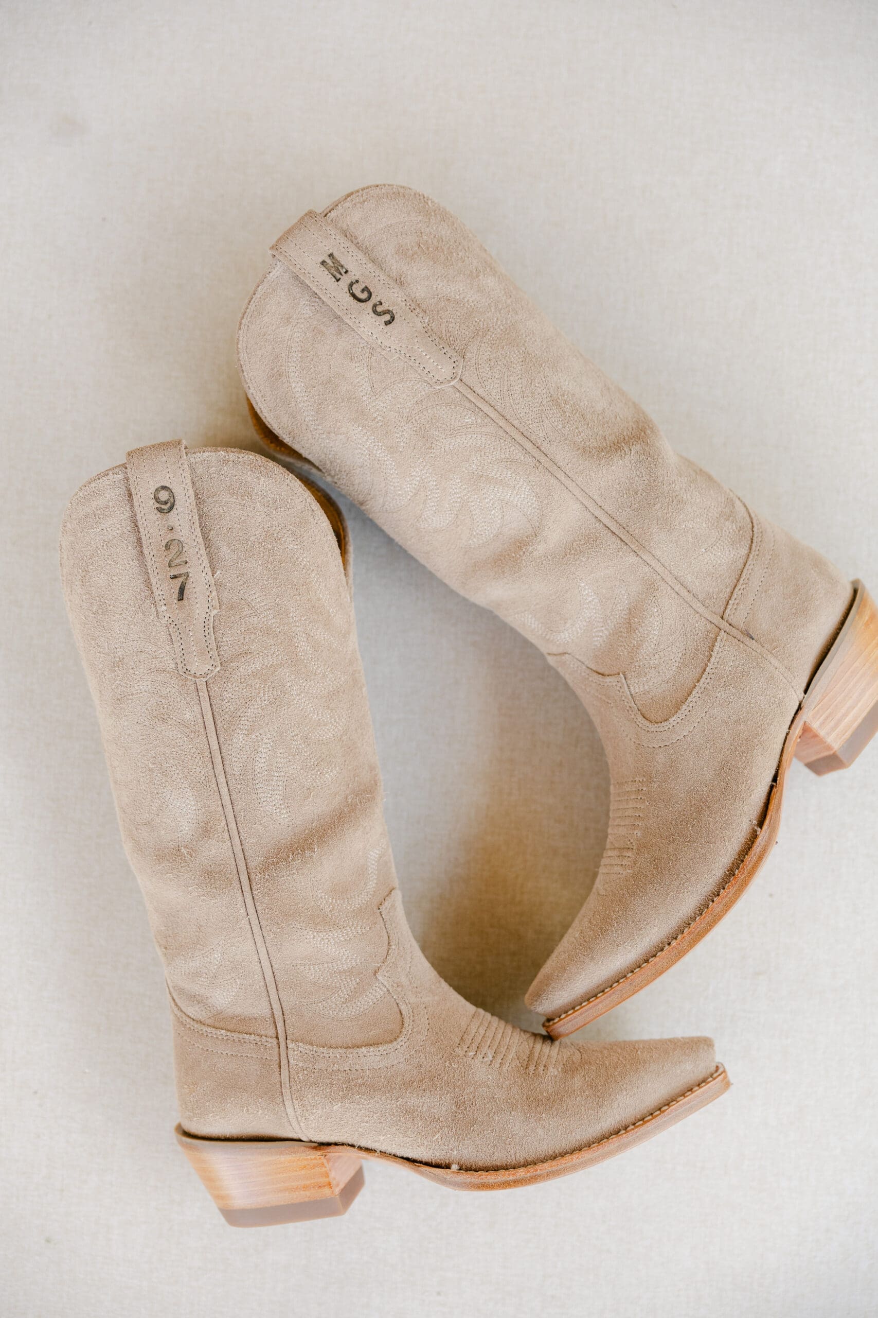 Custom reception Tecovas with wedding date and bride's new initials "MGS"