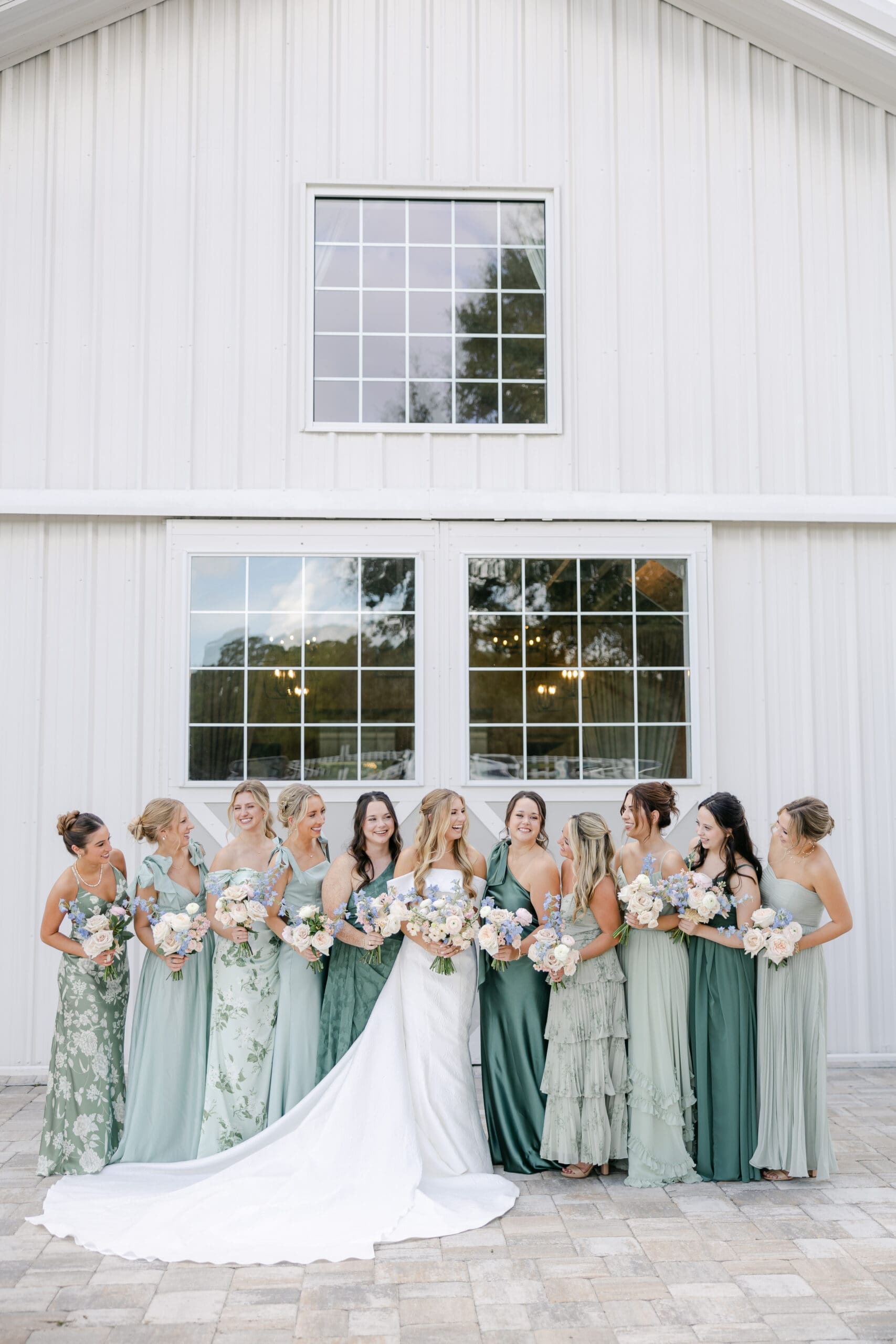 BRidesmaids in the front of the reception venue at Fox Hill Plantation